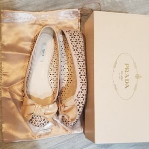 Nude patent leather eyelet Prada flats